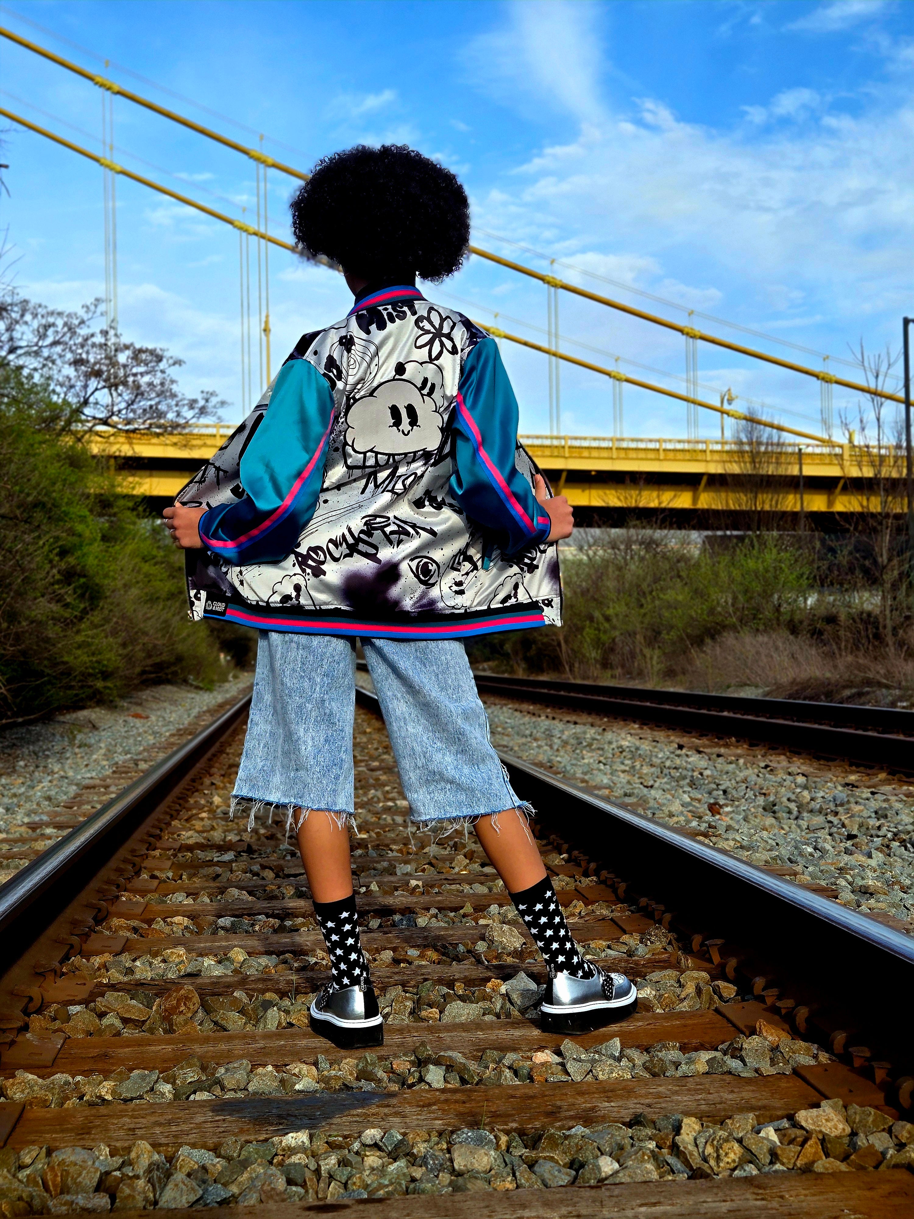 Color graffiti bomber jacket w/teal sleeves
